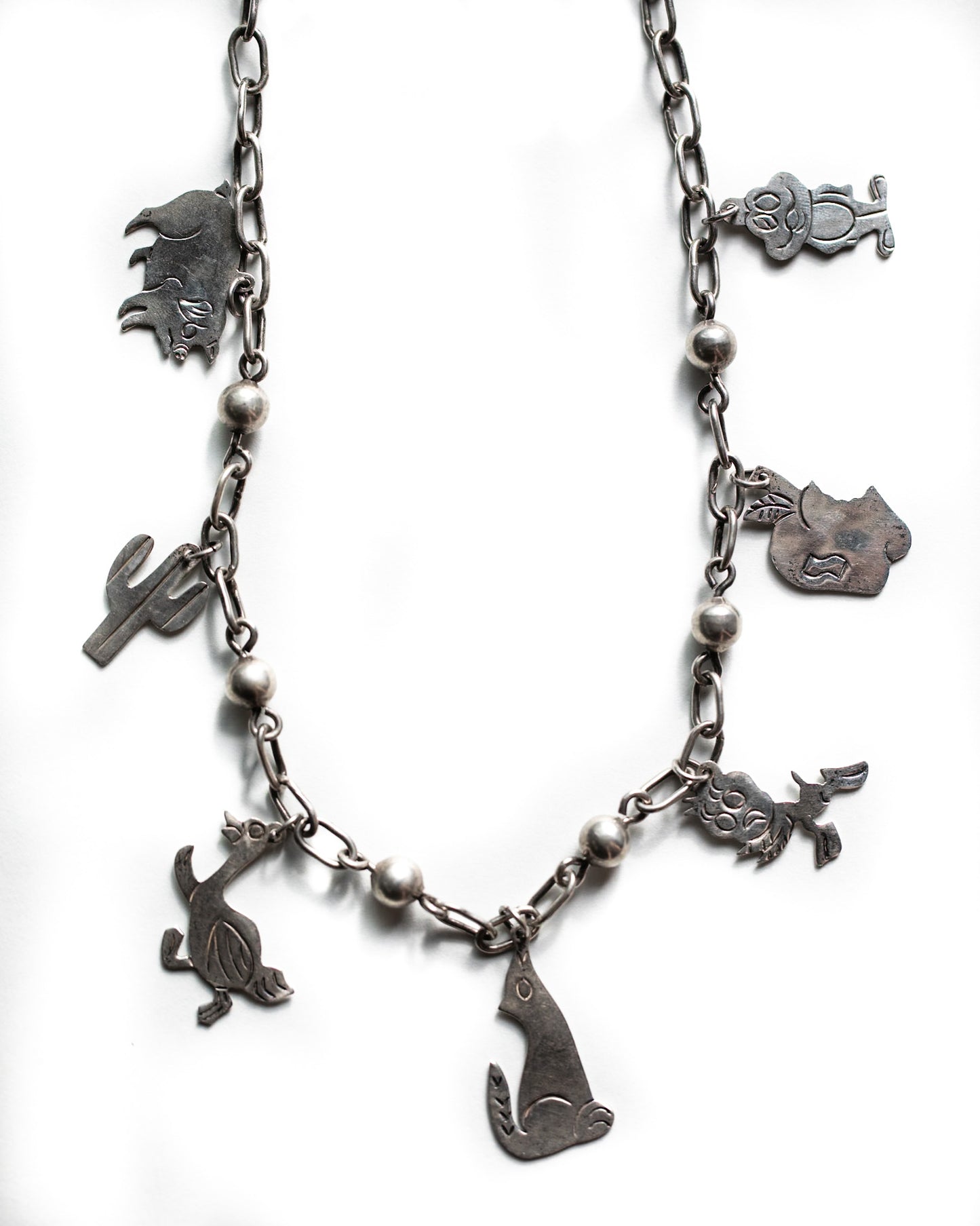 GONE WEST CHARM NECKLACE